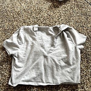 I’m selling a grey crop top hoodie very cute size small.